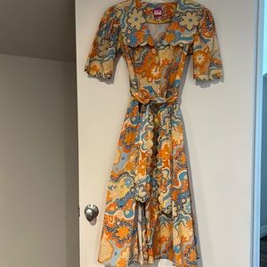 celia B Dress never worn, Size small, slits on both sides in front.